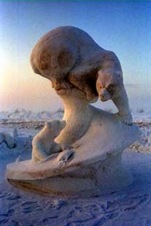 Snow sculpture of bear and cub
